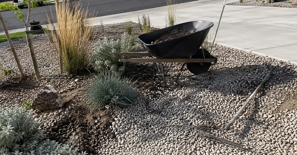 Water-wise Utah garden bed with drought-tolerant perennials, ornamental grasses and decorative gravel